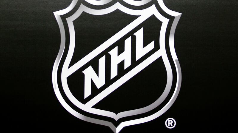 In this June 22, 2016, file photo, the NHL logo is shown during a press conference in Las...
