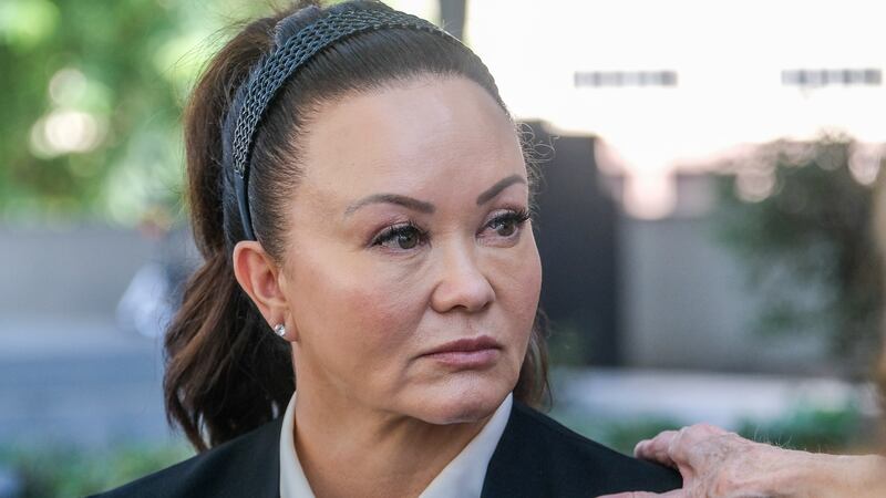FILE - Alana Gee, the widow of a former University of Southern California football player...