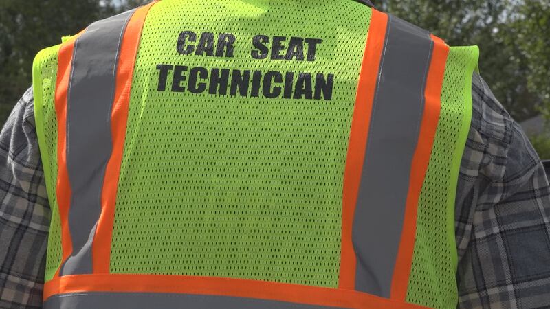 Car Seat Technician in Vest.