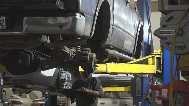 Work being done on a truck in a garage
